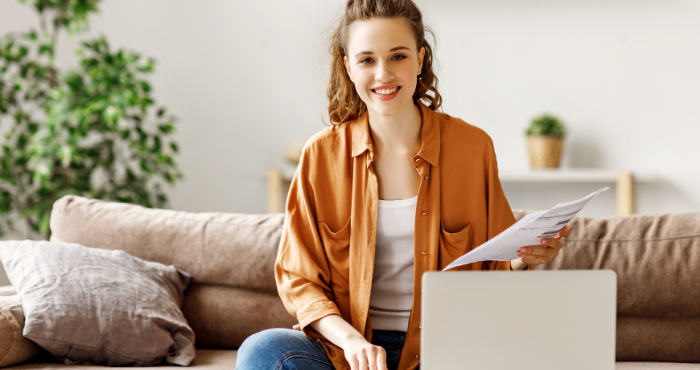 young-woman-studying-at-home-online-on-her-laptop-preparing-for-the-solicitors-qualifying-exam