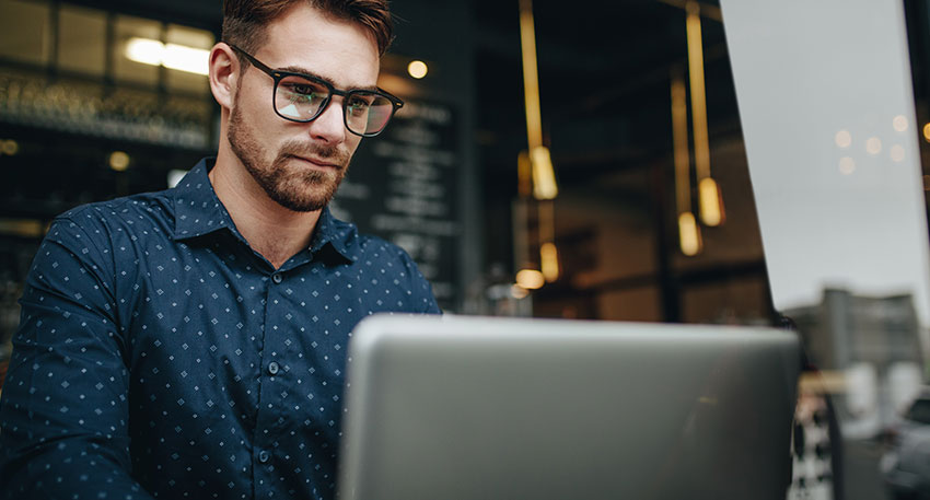 A male barbri student studying