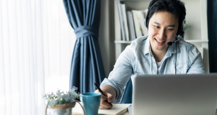 young-male-legal-professional-working-from-home-on-laptop