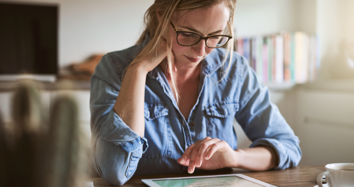 woman-researching-sqe-qwe-on-tablet